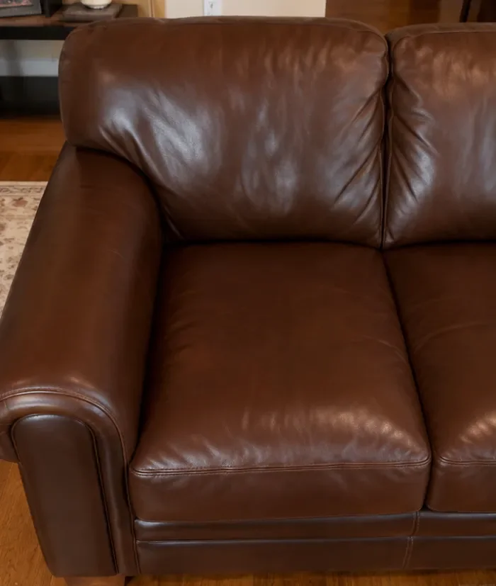 Same leather sofa fully restored — clean, conditioned and revived after treatment